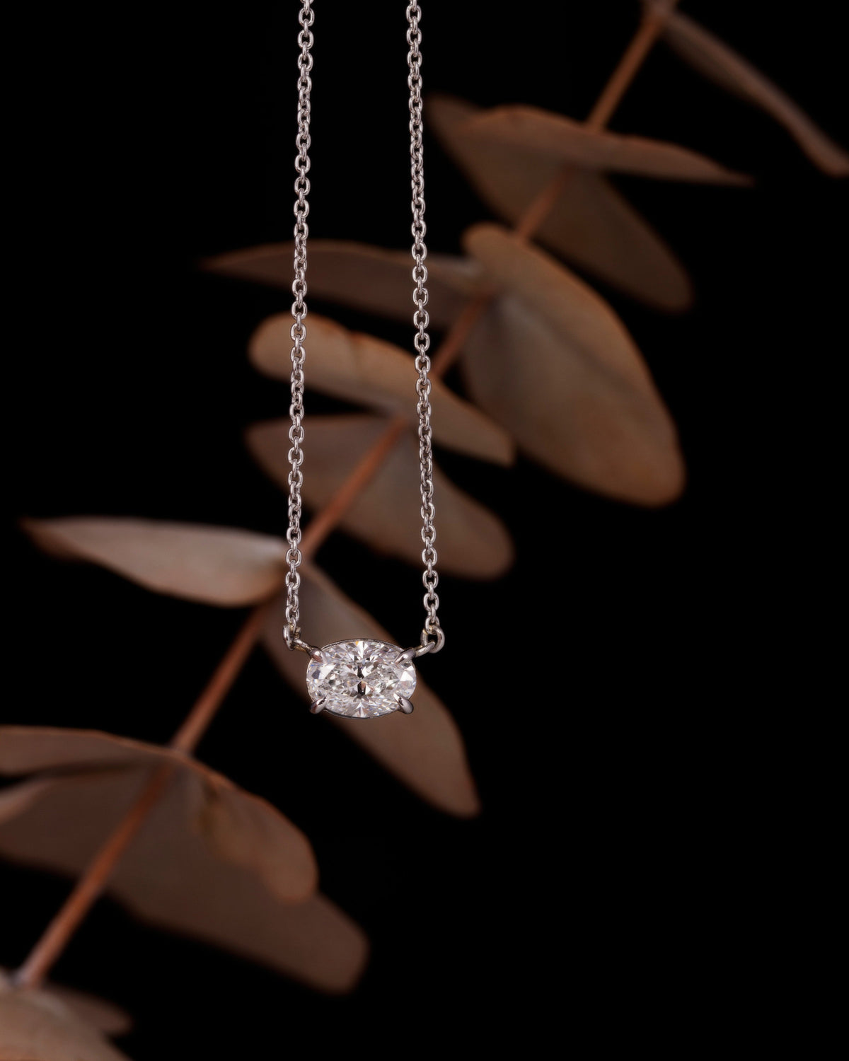 Platinum Oval Diamond pendent in an East-West setting