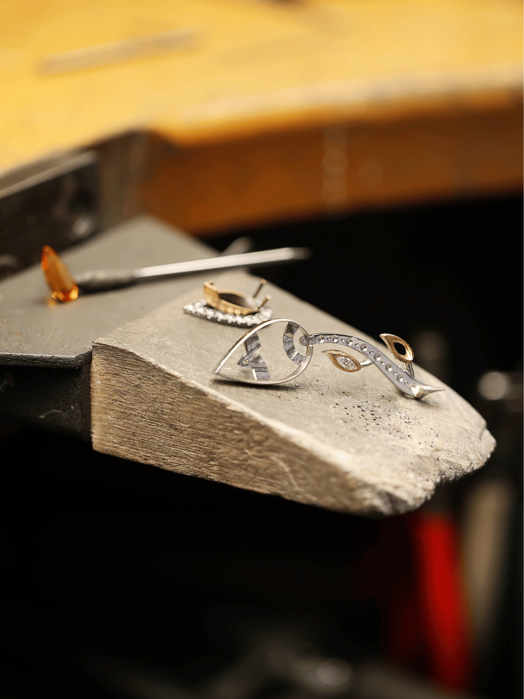 Jewelry on a stone surface with a blurred background