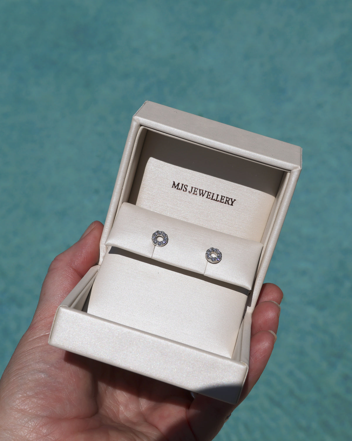 Radiant Rounds - Luminous gemstone set circle studs