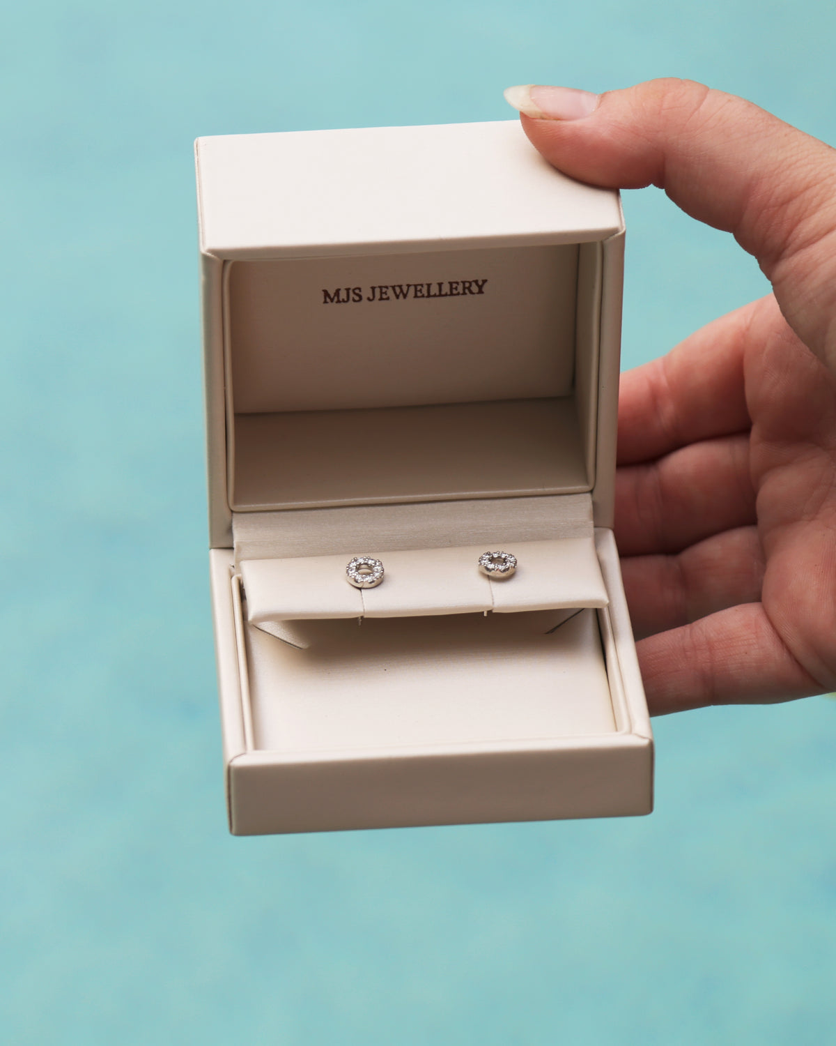 Radiant Rounds - Luminous gemstone set circle studs