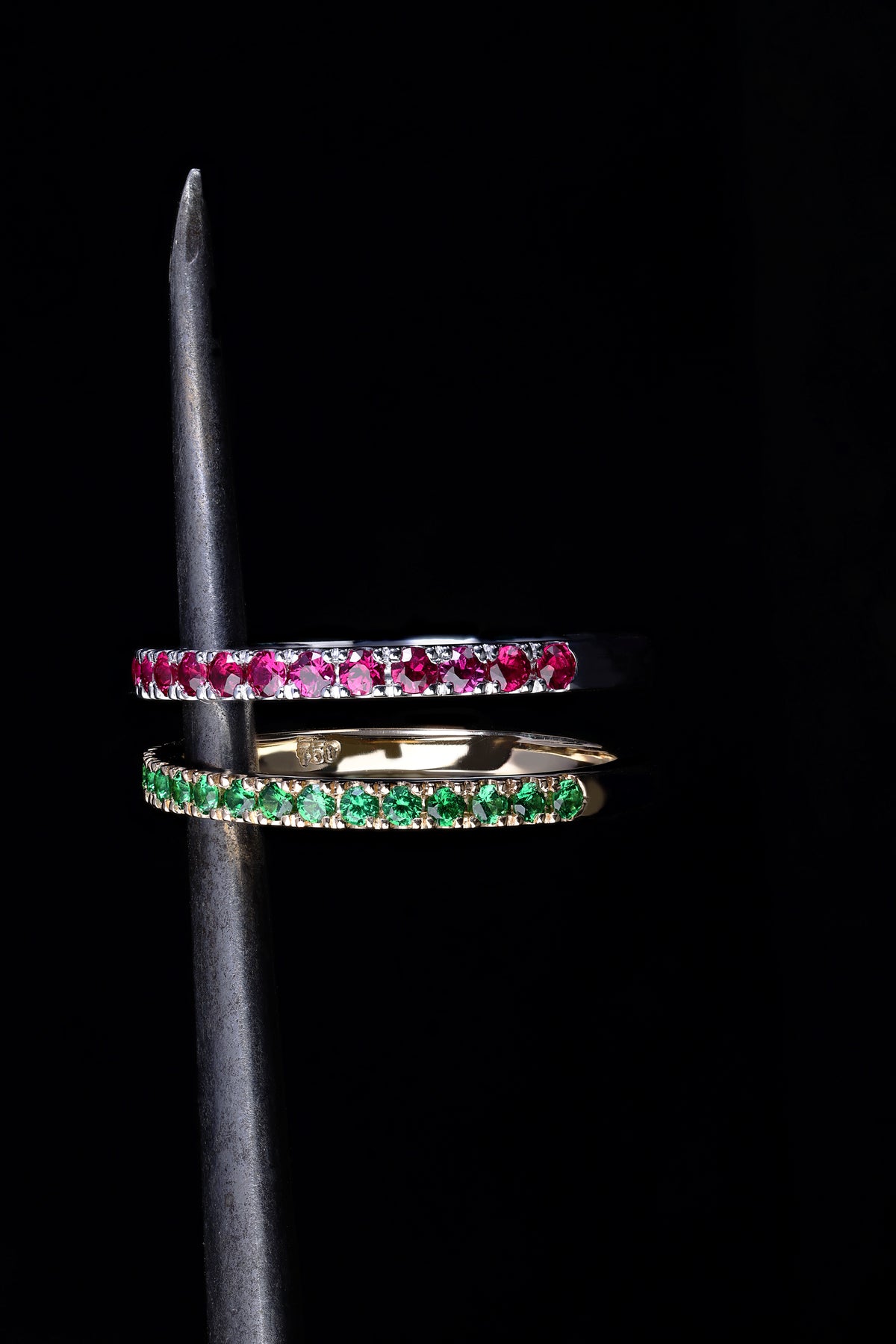 Handcrafted 18ct Yellow Gold band half set with vivid green Tsavorite garnets.