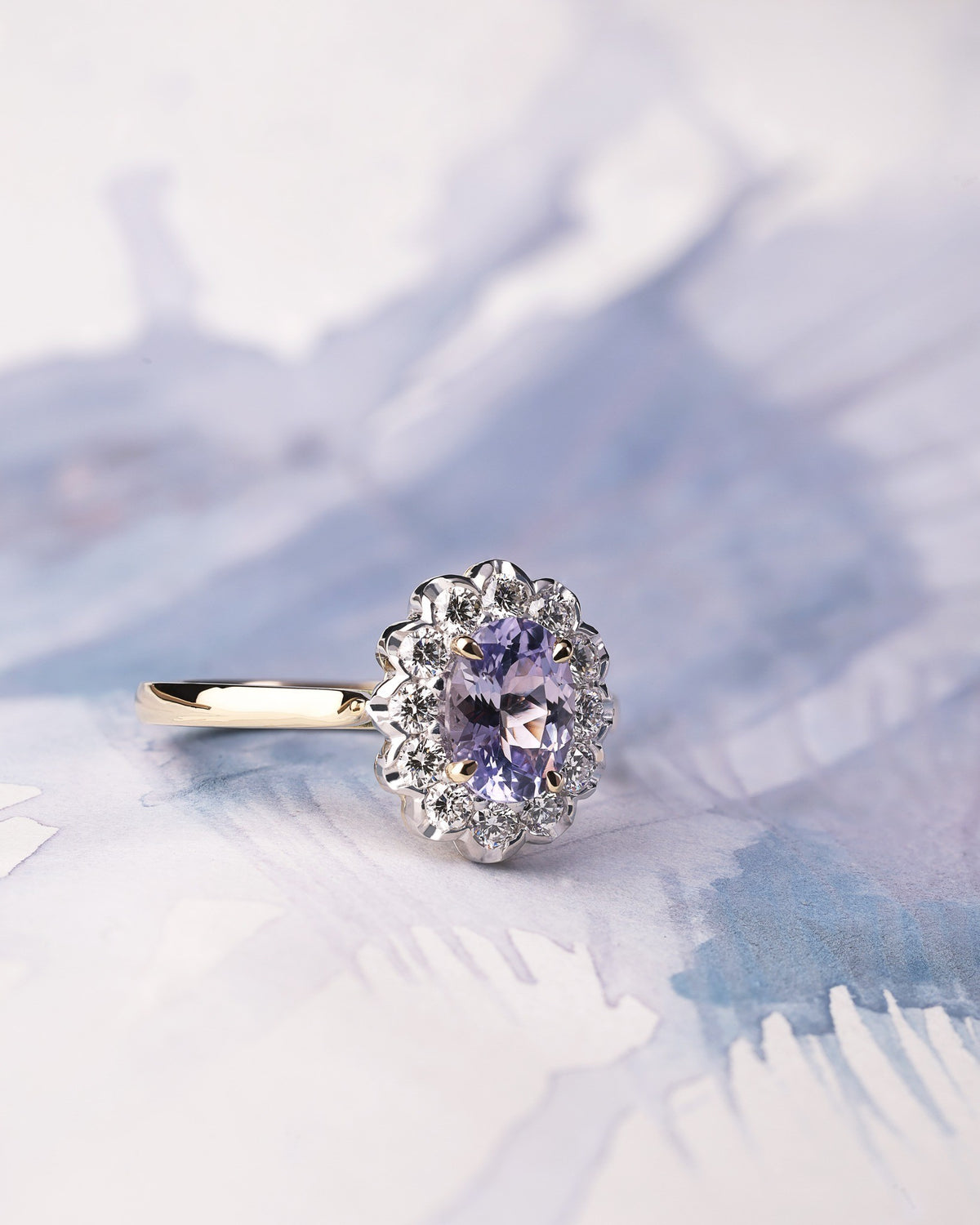 Lavender sapphire and diamond engagement ring handcrafted by Matthew Staff