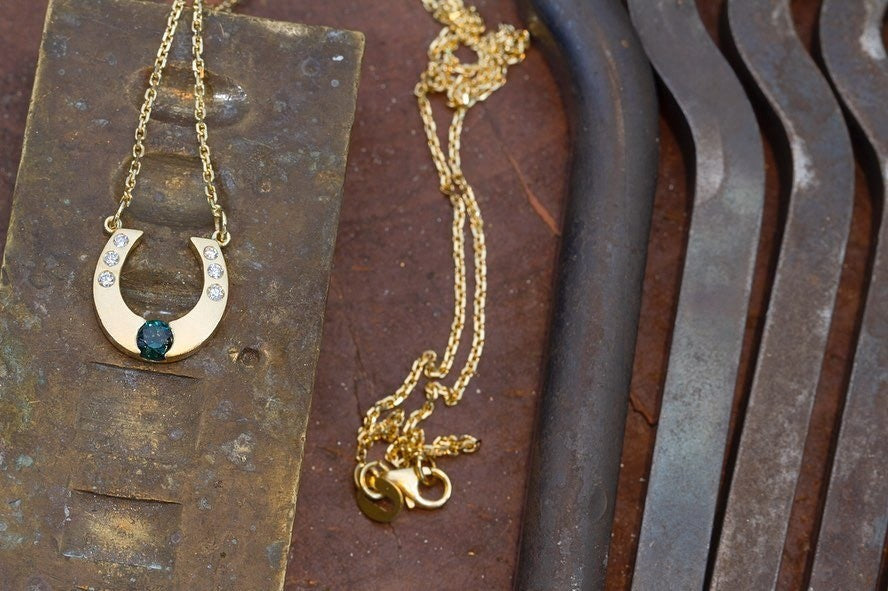 18ct yellow gold by Matthew and features a teal coloured sapphire and diamonds Pendant - PG-BI-077 - image 2