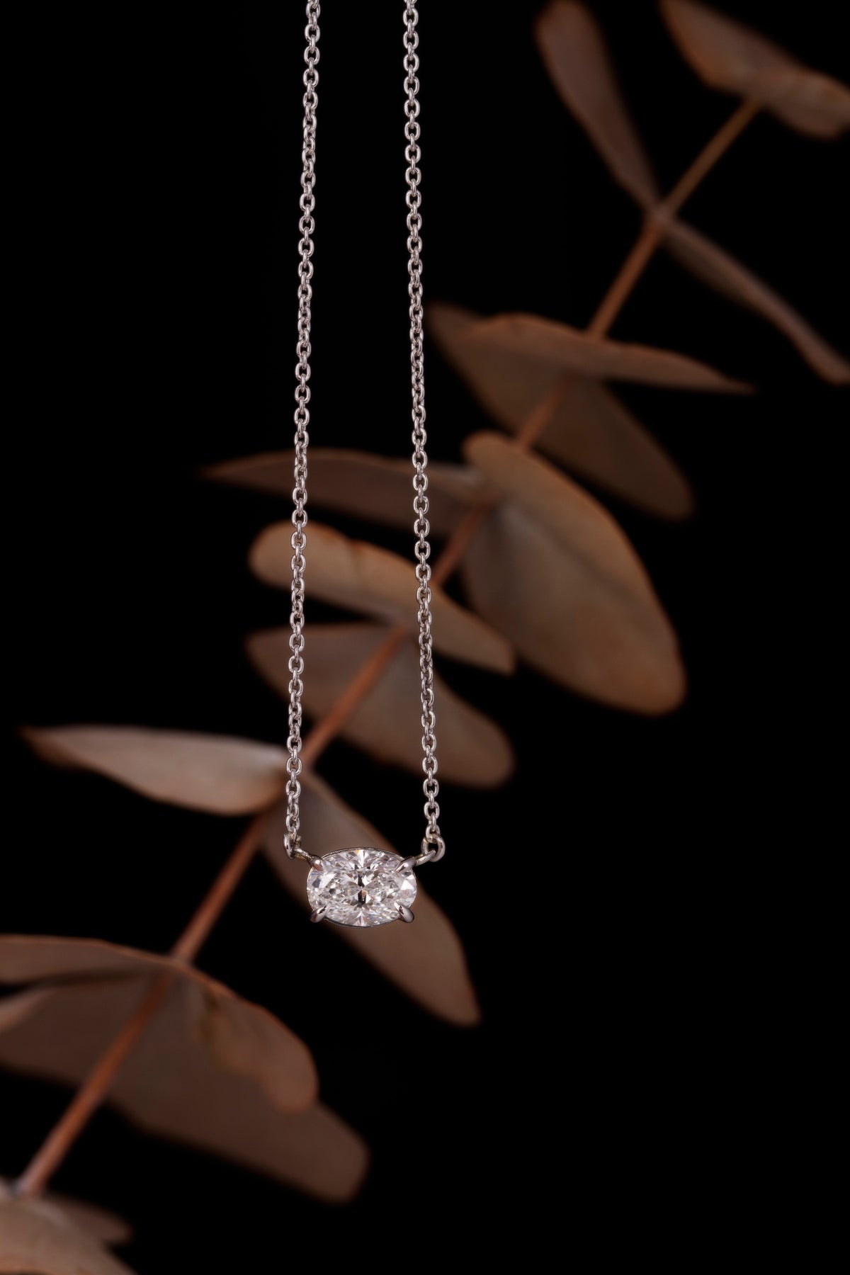 Platinum Oval Diamond pendent in an East-West setting